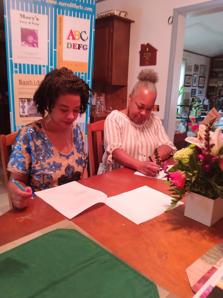 Catherine Harris is the 22nd author at Meredith Etc. Ms. Harris posed with Meredith Coleman McGee, Publisher earlier. Photos were taken by Paris Flanagin. 